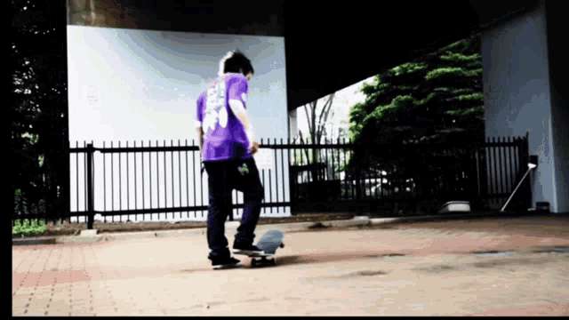 a person wearing a purple shirt with the number 33 on the back