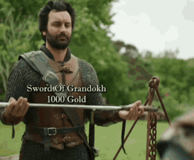 a man is holding a sword that says sword of grandokh 1000 gold on it
