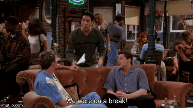 a group of people are sitting on a couch and one of them is saying we were on a break