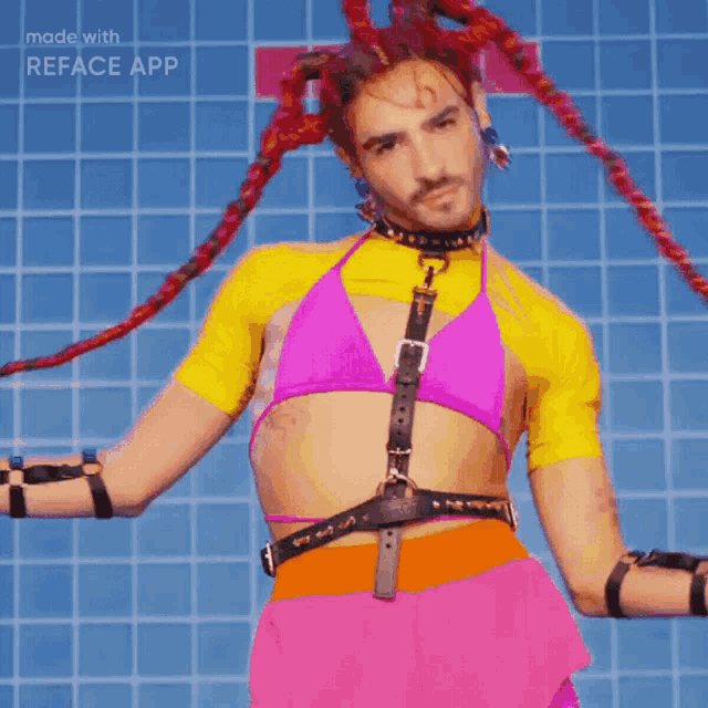 a man wearing a pink bikini top and a yellow top is made with reface app