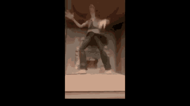 a statue of a man is standing on top of a wooden box .