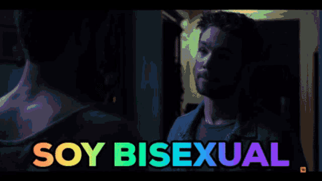 a man with a beard is standing next to another man with the words soy bisexual behind him
