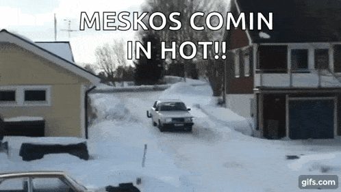 a car is driving down a snow covered road with the words meskos comin in hot