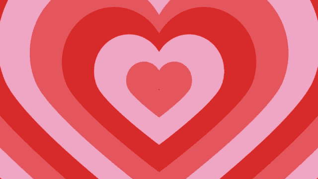 a red and pink heart with a smaller heart in the middle