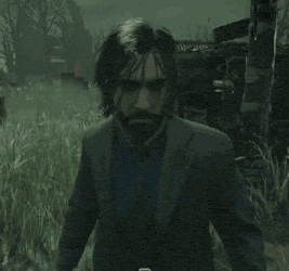 a man in a suit and tie holds a tambourine in his hands