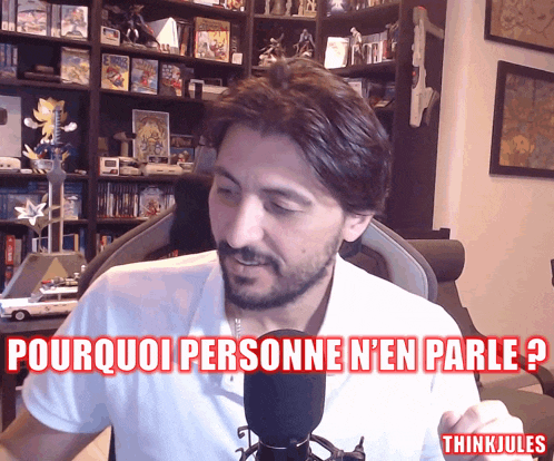 a man talking into a microphone with the words " pourquoi personne n'en parle " written on the bottom