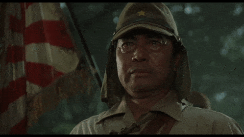 a man in a military uniform with a star on his hat