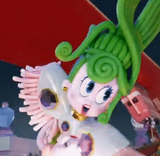 a cartoon character with green hair and a white dress