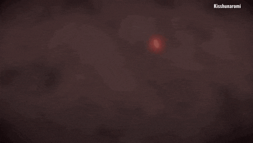 a close up of a person 's face with red eyes and the words kisshunaromi below