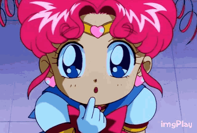 a cartoon girl with pink hair and a heart on her forehead is giving the middle finger ..
