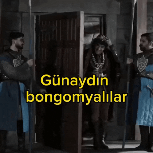 a man with a crown on his head is standing in front of a door with the words günaydin bongomyallar written on it