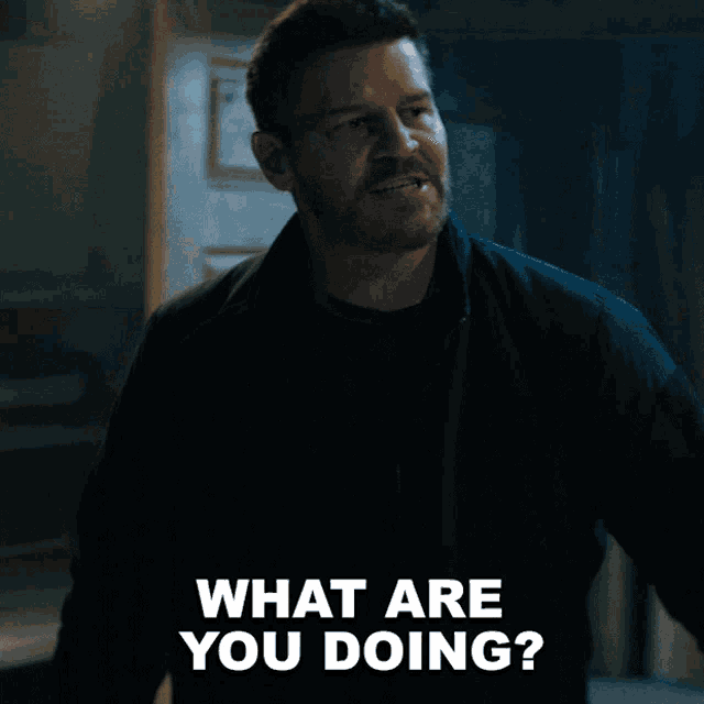 a man says what are you doing in white letters
