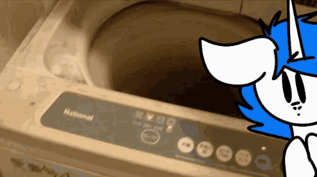 a blue and white cartoon character is standing next to a national brand washing machine