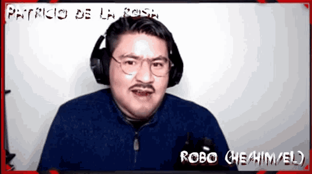 a man wearing headphones and a mustache is standing in front of a screen that says patricio de la rosa