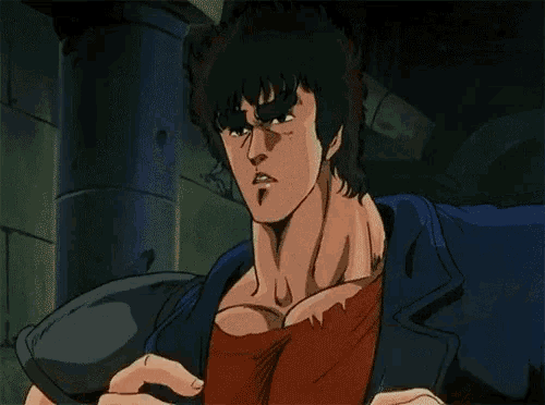 a man in a blue shirt is holding a red object