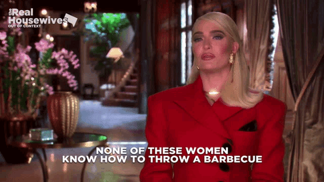 a woman in a red jacket with the words none of these women know how to throw a barbecue