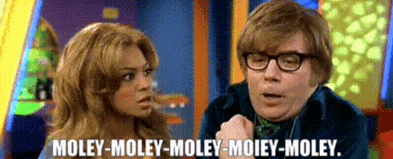 a man and a woman are standing next to each other and the man says moley-moley-moley