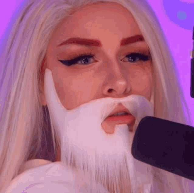 a woman with a fake beard on her face