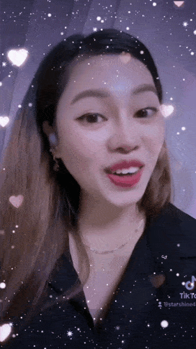 a close up of a woman 's face with hearts and stars behind her and the words tik tok on the bottom
