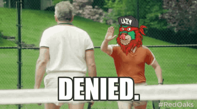a man wearing a lazy hat waves to another man on a tennis court with the caption denied
