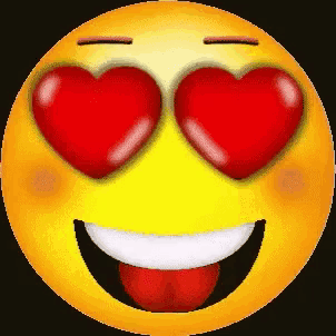 a yellow smiley face with red heart shaped eyes