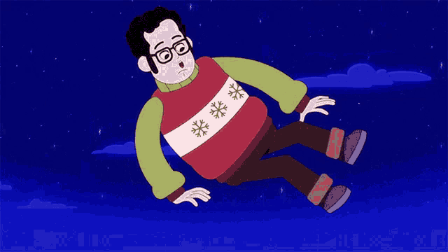 a man in a sweater with snowflakes on it is falling