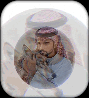 a man is holding a wolf in his arms