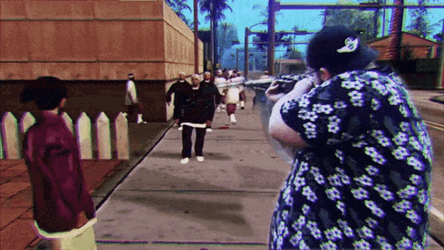 a man wearing a hat with the letter s on it is shooting a gun
