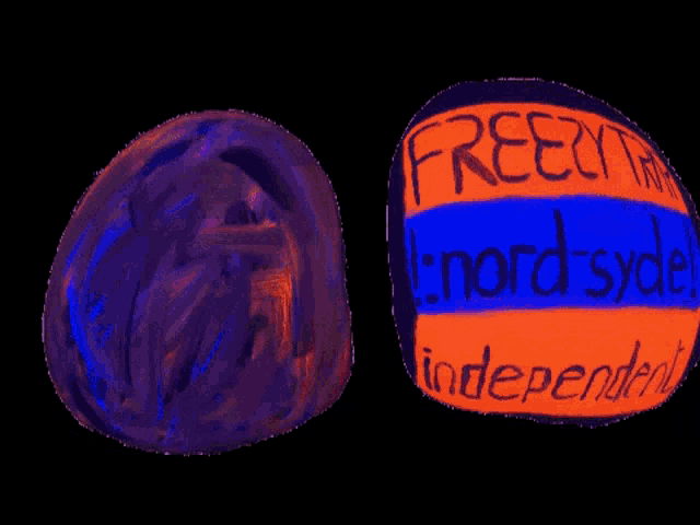 two glow in the dark eggs one of which says freem nord-syde independent on it