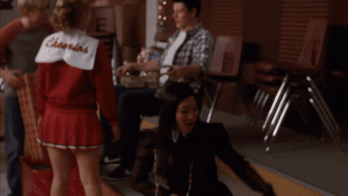 cory monteith is the name of the person holding a box
