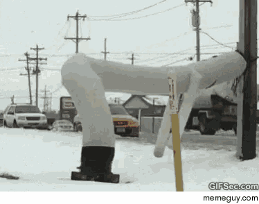 a snowman is standing in the snow next to a sign that says ' gifsec.com memeguy.com '