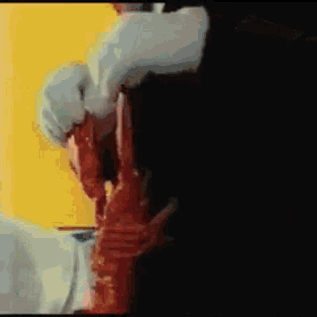 a close up of a person 's face with blood coming out of it .