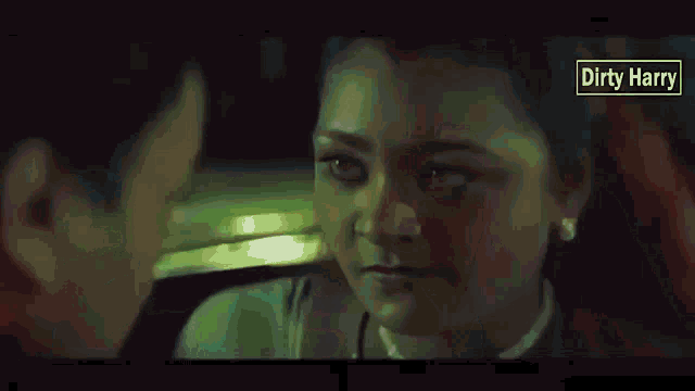 a man is touching a woman 's face in a movie called dirty hairy .