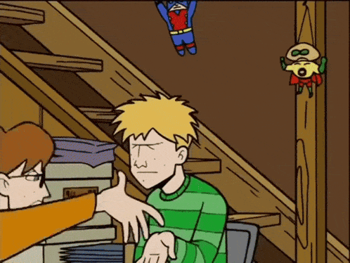 a cartoon shows a man pointing at another man while a superhero is hanging from the ceiling