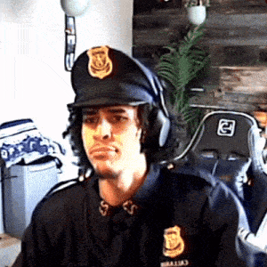 a man in a police uniform is wearing headphones and a hat that has the letter d on it