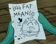 a piece of paper that says big fat meanie