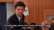 a man in a suit and tie says it 's a white flag