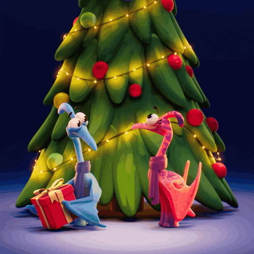 two dinosaurs are standing next to a christmas tree