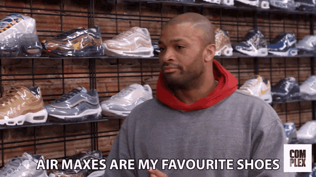 a man says air maxes are my favourite shoes in front of a display of shoes