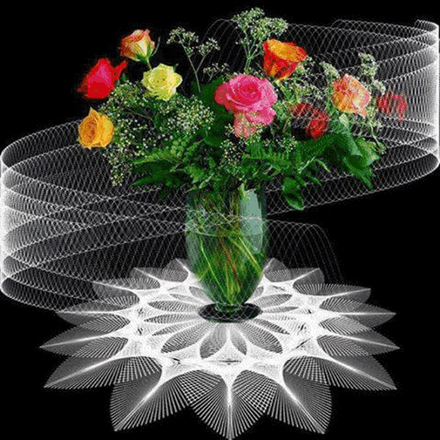 a vase filled with colorful roses is sitting on a white table cloth on a table .