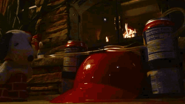 a can of diet coke sits next to a red bowl