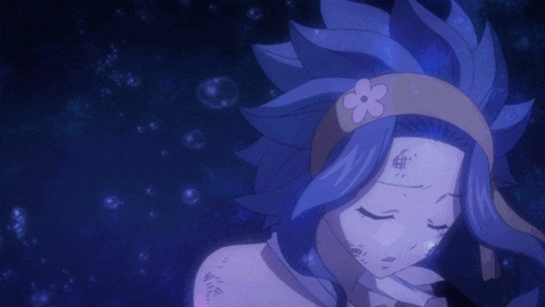 a girl with blue hair and a flower in her hair is laying down with her eyes closed