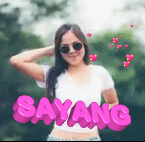 a woman wearing sunglasses and a white shirt is surrounded by the words sayang