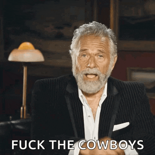 a man with a beard pointing at the camera with the words " fuck the cowboys " written below him
