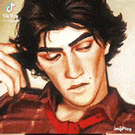 a close up of a man 's face with his eyes closed and a red tie .
