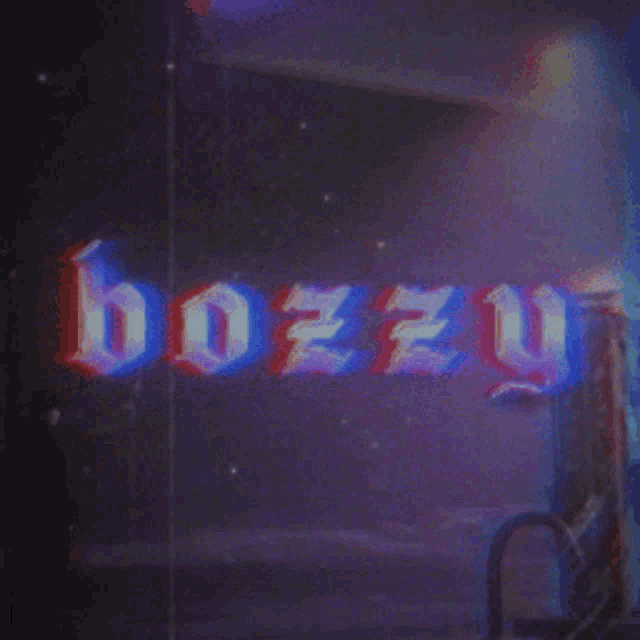 the word bozzy is displayed on a wall
