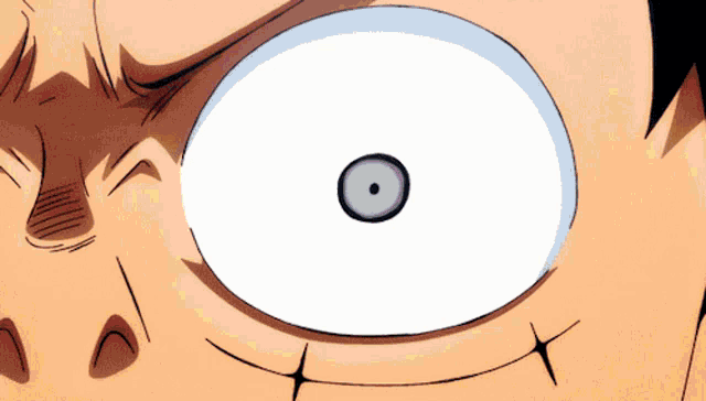 a close up of a cartoon character 's eye with a white pupil