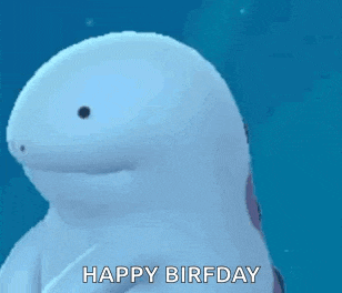a white dolphin is swimming in the ocean and saying `` happy birfday '' .