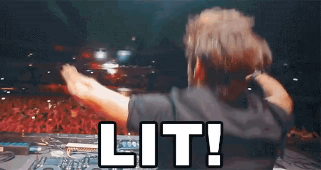 a dj says lit while playing music in front of a crowd