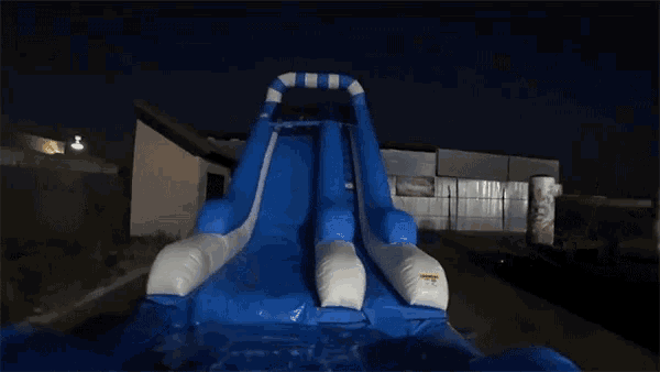 Inflatable Inflatable Water Slide GIF - Inflatable Inflatable Water Slide Night Swimming GIFs